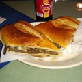 beef and onion sandwich - El Castillo de Madison